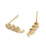 Gold plated ear studs.